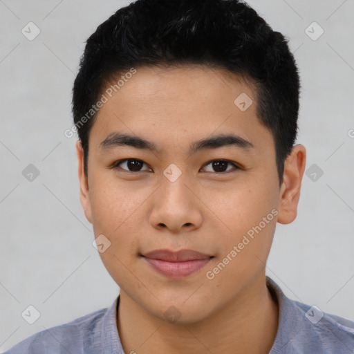 Joyful asian young-adult male with short  black hair and brown eyes