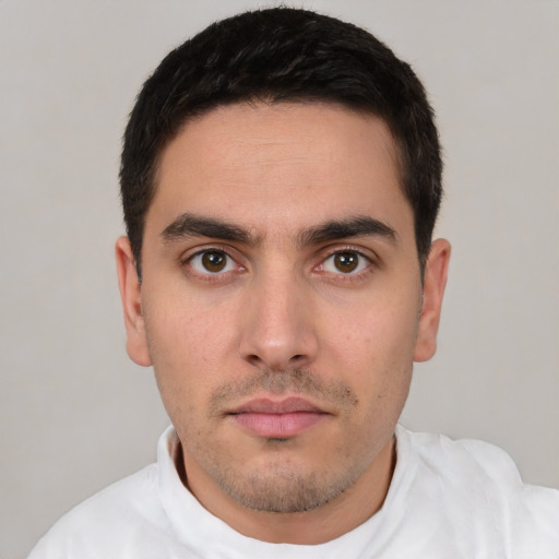 Neutral white young-adult male with short  black hair and brown eyes