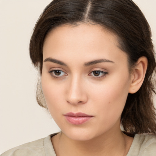 Neutral white young-adult female with medium  brown hair and brown eyes