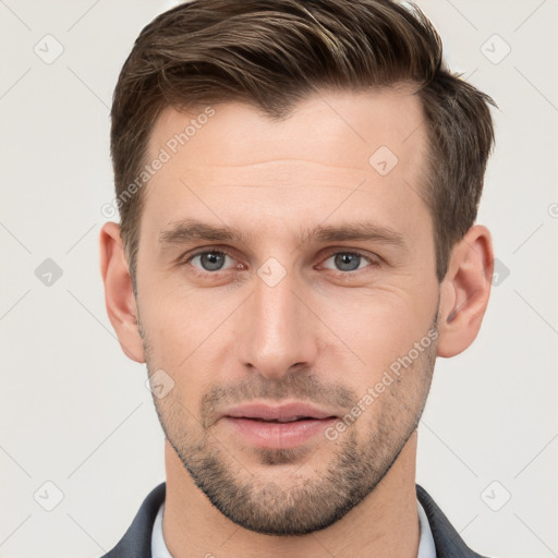 Neutral white young-adult male with short  brown hair and grey eyes