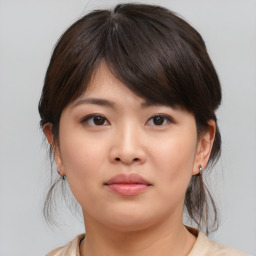 Neutral asian young-adult female with medium  brown hair and brown eyes