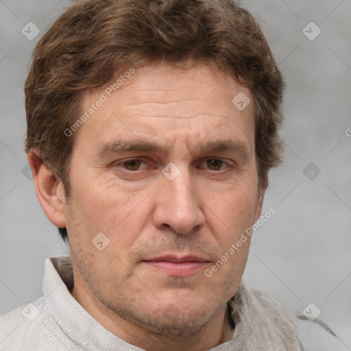 Joyful white adult male with short  brown hair and grey eyes