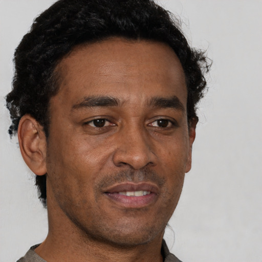 Neutral black young-adult male with short  brown hair and brown eyes