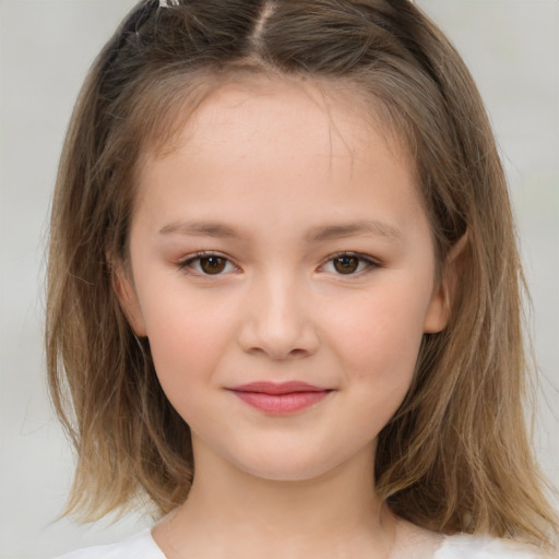 Joyful white child female with medium  brown hair and brown eyes