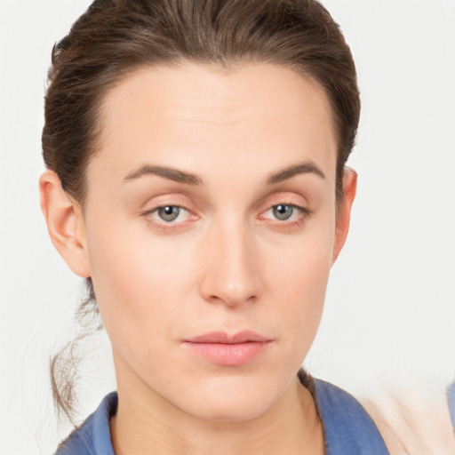 Neutral white young-adult female with short  brown hair and grey eyes