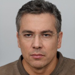 Neutral white adult male with short  brown hair and brown eyes