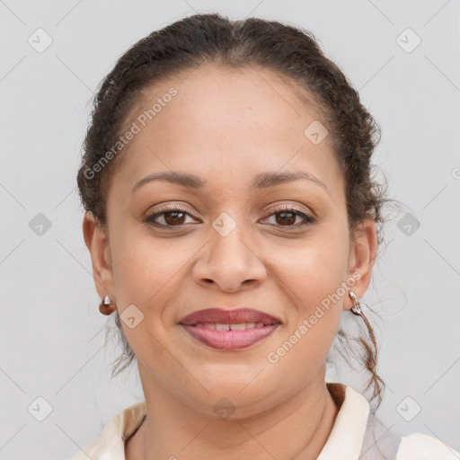 Joyful latino young-adult female with medium  brown hair and brown eyes