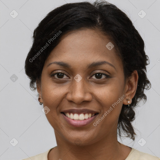 Joyful black young-adult female with medium  brown hair and brown eyes