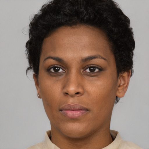 Neutral black young-adult female with short  brown hair and brown eyes