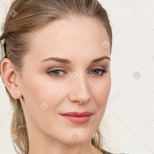 Joyful white young-adult female with long  brown hair and blue eyes