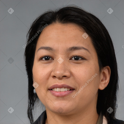 Joyful asian adult female with medium  brown hair and brown eyes