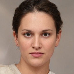 Neutral white young-adult female with short  brown hair and brown eyes