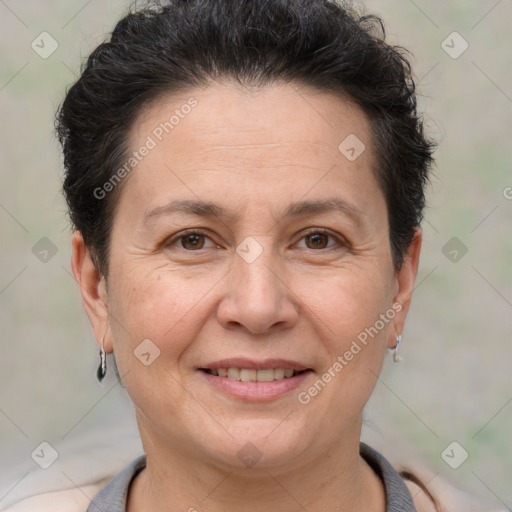 Joyful white adult female with short  brown hair and brown eyes