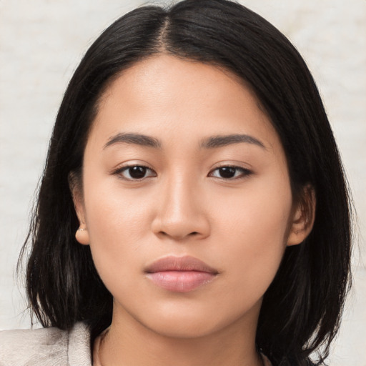 Neutral asian young-adult female with medium  black hair and brown eyes