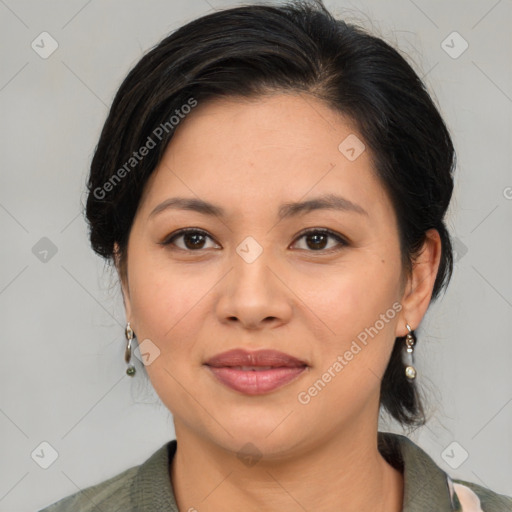 Joyful asian young-adult female with medium  brown hair and brown eyes