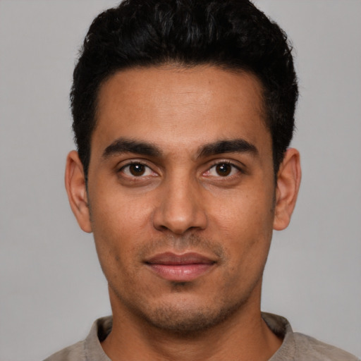 Neutral latino young-adult male with short  black hair and brown eyes