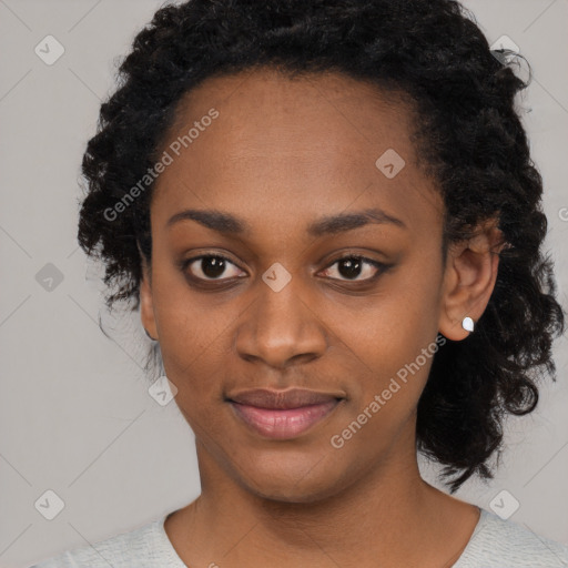 Joyful black young-adult female with medium  black hair and brown eyes