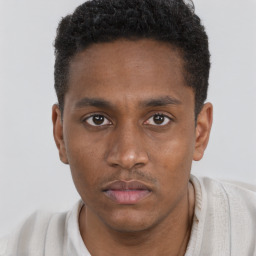 Neutral black young-adult male with short  brown hair and brown eyes