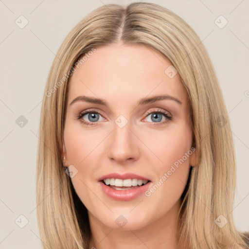 Joyful white young-adult female with long  brown hair and green eyes