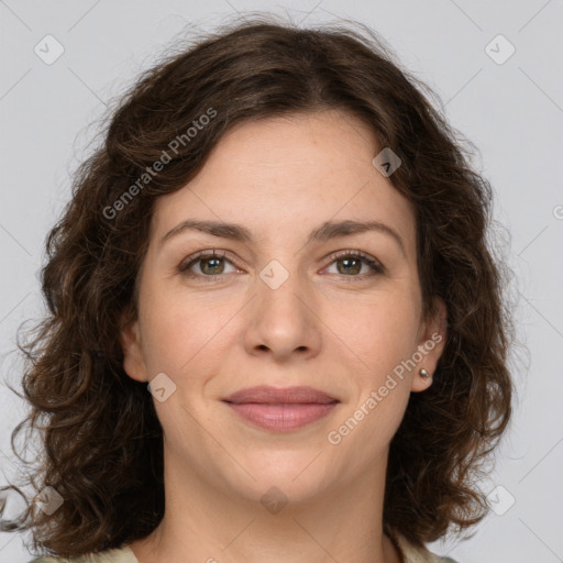 Joyful white young-adult female with medium  brown hair and green eyes