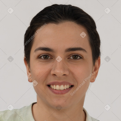 Joyful white young-adult female with short  brown hair and brown eyes