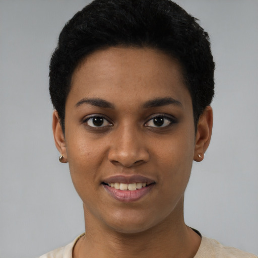 Joyful latino young-adult female with short  black hair and brown eyes