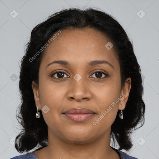 Joyful black young-adult female with medium  brown hair and brown eyes