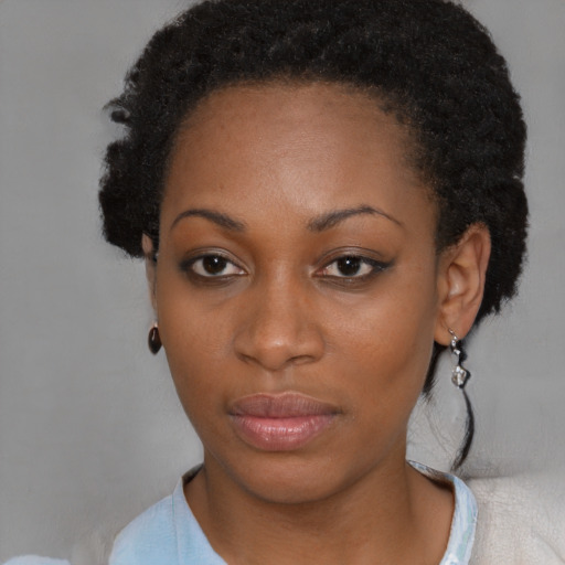 Neutral black young-adult female with short  brown hair and brown eyes