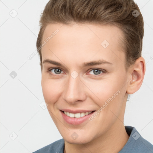 Joyful white young-adult female with short  brown hair and brown eyes