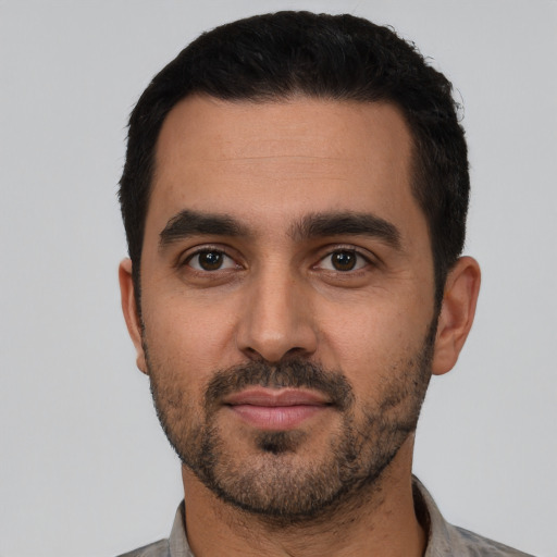 Neutral white young-adult male with short  black hair and brown eyes