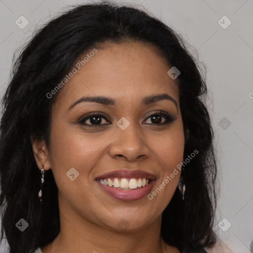 Joyful latino young-adult female with long  brown hair and brown eyes