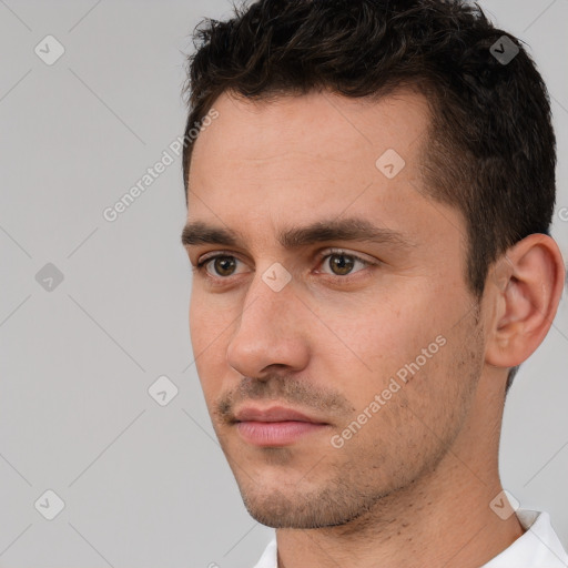 Neutral white young-adult male with short  brown hair and brown eyes