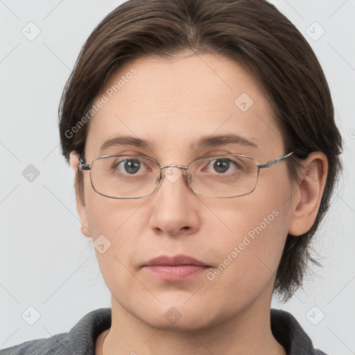 Neutral white adult female with medium  brown hair and grey eyes