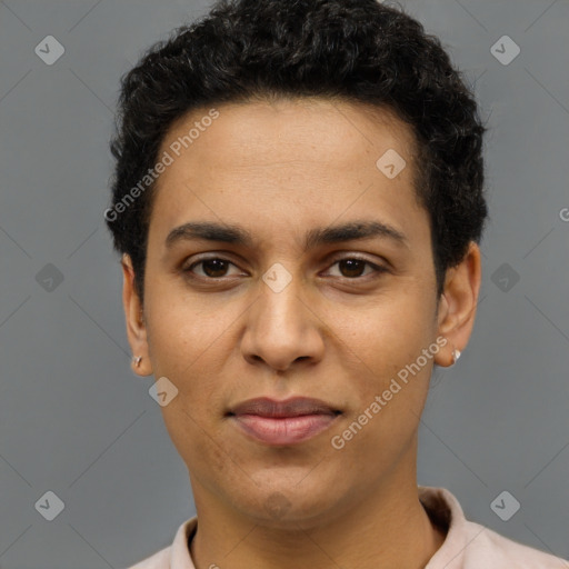 Joyful latino young-adult male with short  brown hair and brown eyes