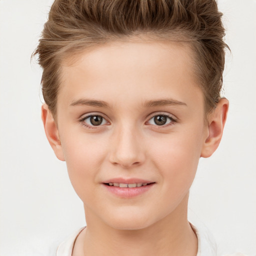 Joyful white child female with short  brown hair and brown eyes