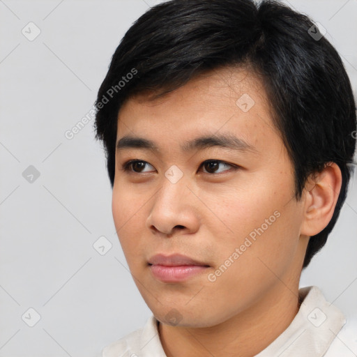 Neutral asian young-adult male with short  black hair and brown eyes