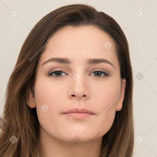 Neutral white young-adult female with long  brown hair and brown eyes