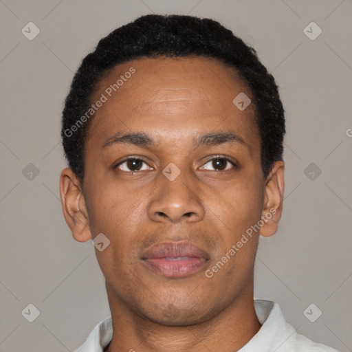 Joyful black young-adult male with short  black hair and brown eyes