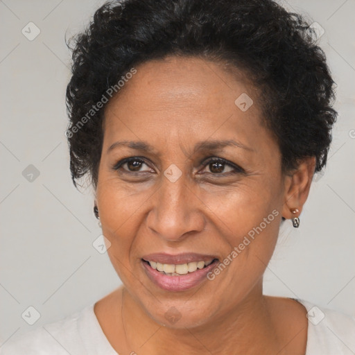 Joyful black adult female with short  brown hair and brown eyes