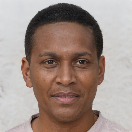 Neutral black adult male with short  black hair and brown eyes