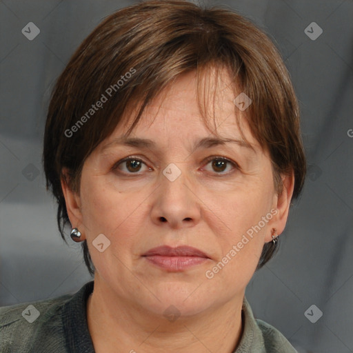 Joyful white adult female with medium  brown hair and grey eyes