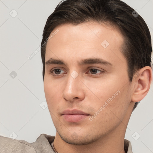 Neutral white young-adult male with short  brown hair and brown eyes