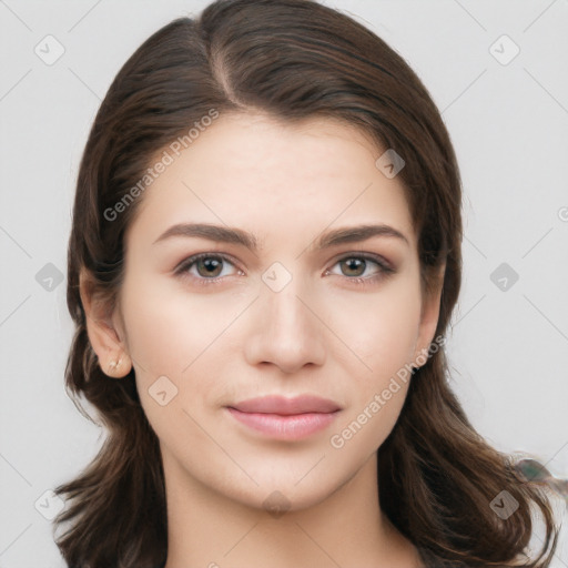 Neutral white young-adult female with long  brown hair and brown eyes