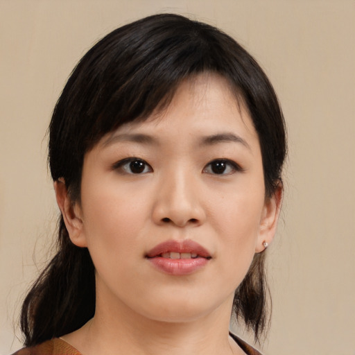 Neutral asian young-adult female with medium  black hair and brown eyes