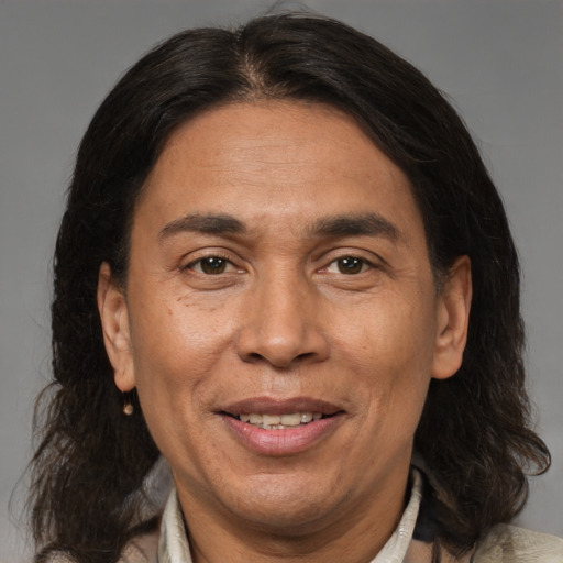 Joyful white adult male with medium  brown hair and brown eyes