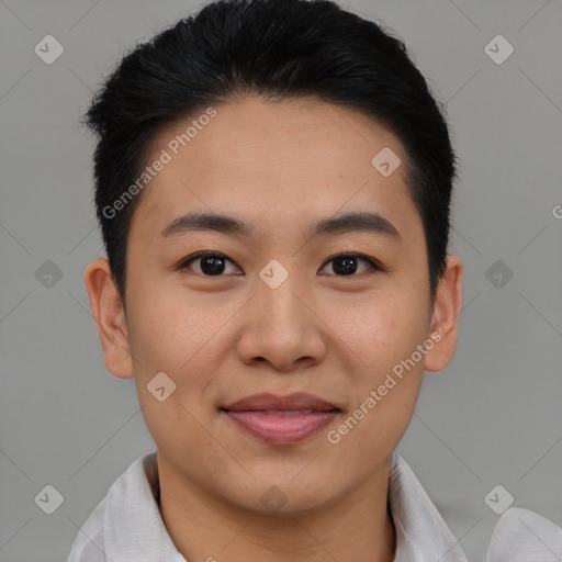 Joyful asian young-adult male with short  brown hair and brown eyes