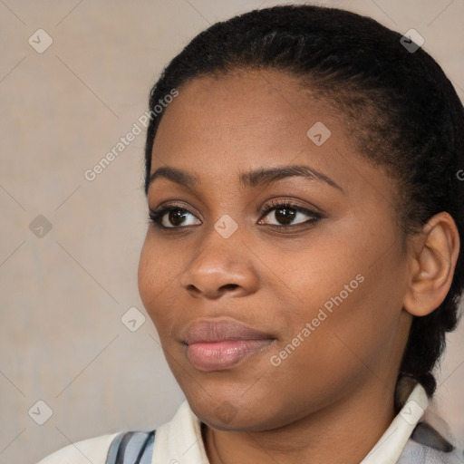 Joyful black young-adult female with medium  brown hair and brown eyes