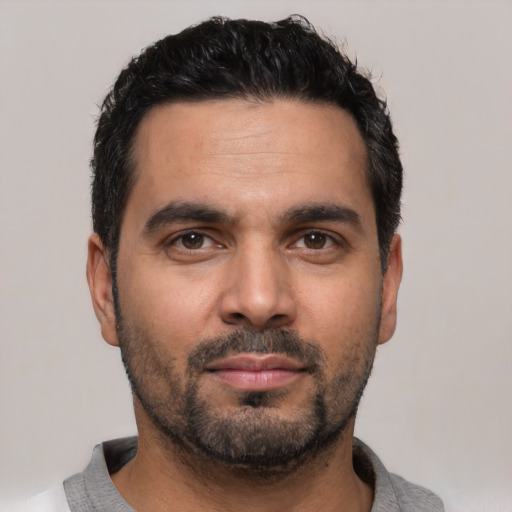 Neutral white young-adult male with short  black hair and brown eyes
