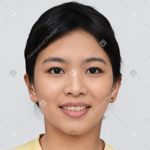 Joyful asian young-adult female with medium  black hair and brown eyes