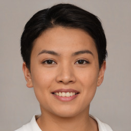 Joyful asian young-adult female with short  brown hair and brown eyes